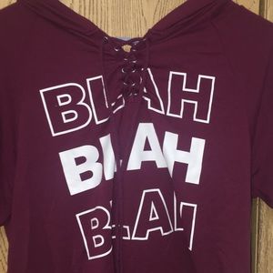 maroon top-“blah blah blah”